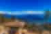 View looking out across Dochula Pass with memorial chortens in Bhutan mountains