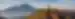 Hiker staying on top of Mount Batur, Indonesia, on a clear day at the sun is setting