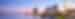 A pink and blue sky at dusk over the skyline of New Orleans, Lousiana, USA