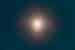 A total solar eclipse in progress as the sun begins to dissappear behind the moon