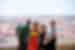 Group of Intrepid travellers laughing with city view in Lisbon, Portugal