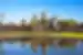 TKPC - View of Angkor Wat across lake on a sunny day