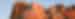 The four faces of Mount Rushmore at sunset, glowing orangey pink, South Dakota, USA