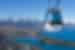 Skyline gondola in front of Queenstown landscape of vast mountains in the background, New Zealand