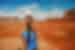 Woman in Monument Valley during a Navajo guided tour, Utah, USA