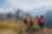 Intrepid travellers talk and laught together at the Machu Picchu lookout in Peru