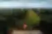Intrepid traveller couple on viewing platform marvelling at the Chocolate HIlls in Bohol Philippines