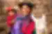 Mother and child in traditional dress with llama, Cusco, Peru