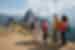 Intrepid leader talks to travellers as they stop in awe at Machu Picchu in Peru
