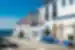 The colourful bright buildings of Porto Covo, Portugal