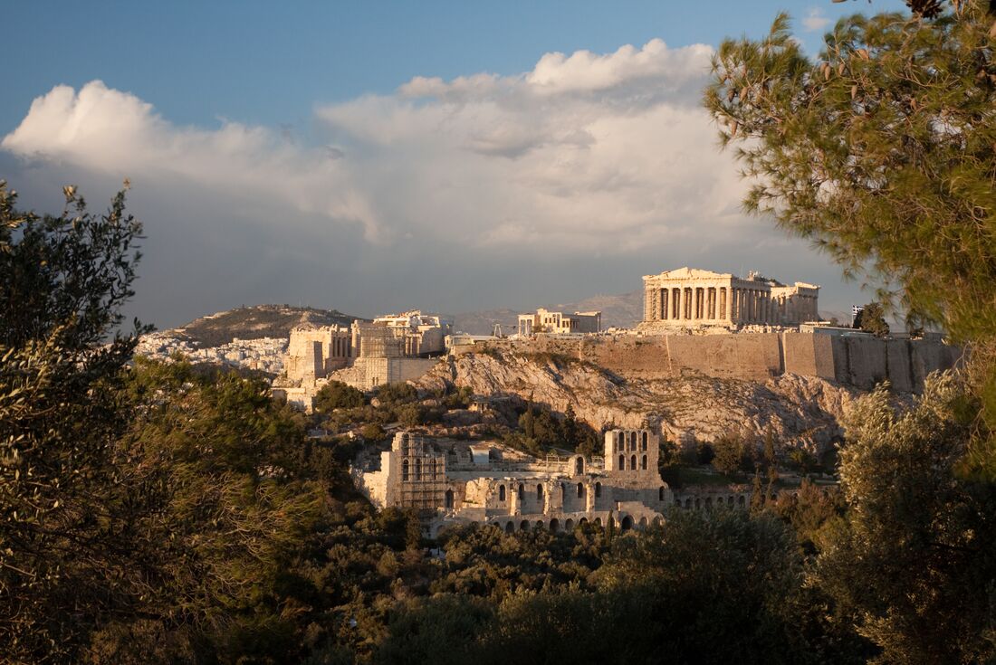 The Acropolis of Athens on Filopapou hill in Greece at sunset