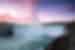 Gentle mist drifts off Niagara Falls at sunset in southern Canada