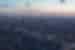 Aerial view of Tokyo at sunset with the Arakawa River flowing through the city