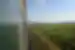 Green Trans-Mongolian train curves into the grasslands of Mongolia and China