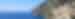 A panoramic of the Amalfi Coast in Italy with land and sea.