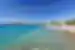 Clear waters of Trizonia Island coast in Greece